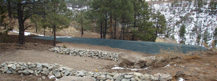 Retention basin and rock check dams after construction